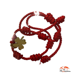 Pulsera 7 nudos roja con trébol dorado